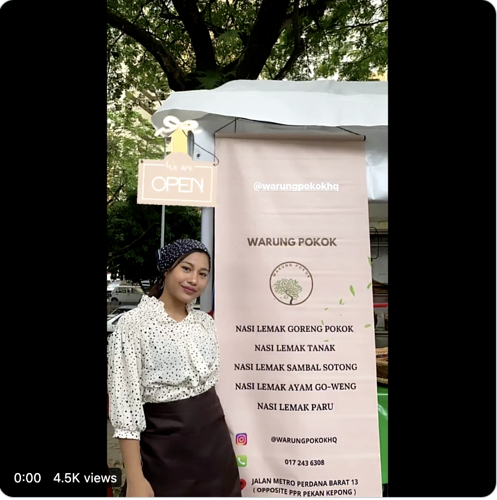 Top UKM student sells Nasi Lemak by the roadside while waiting for her convocation