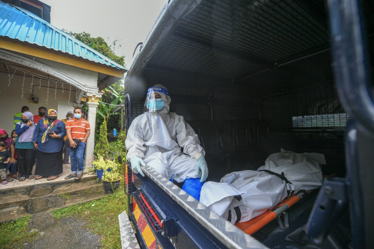 Victim's body after being slashed by her son