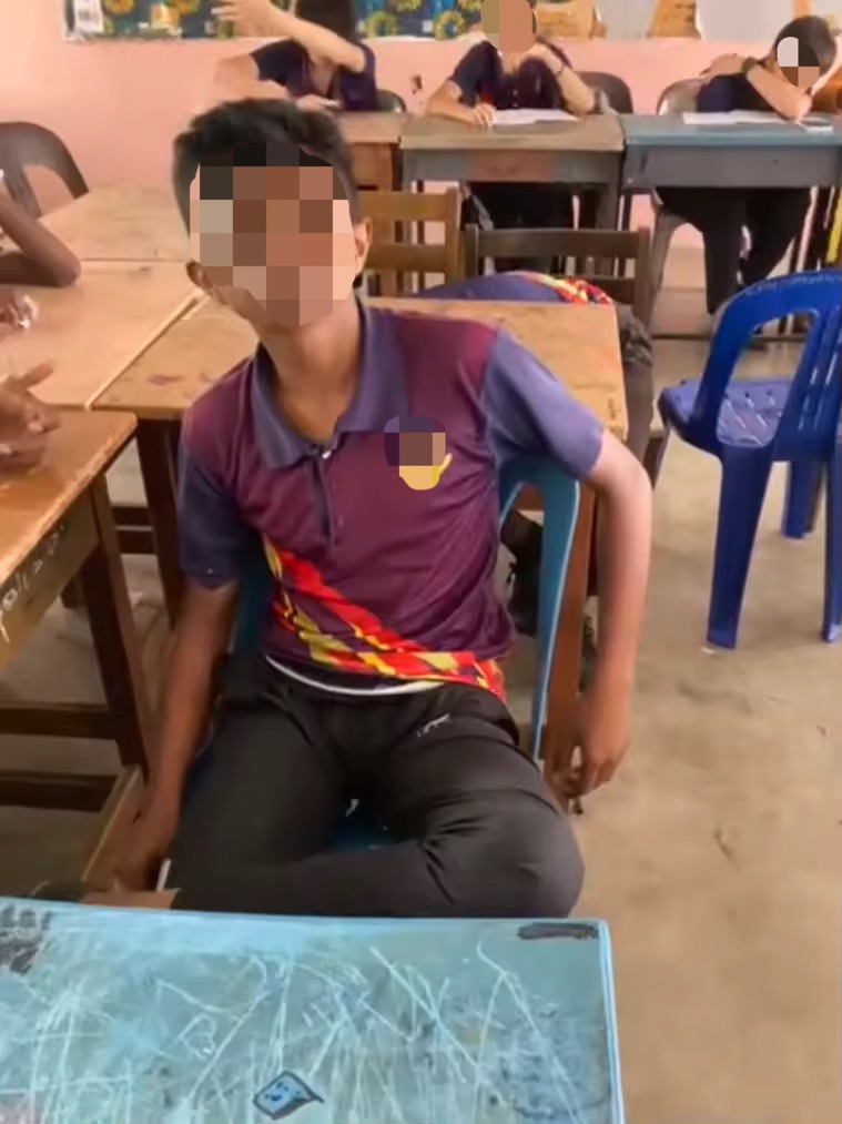 Boy acting cool after being rude to teacher