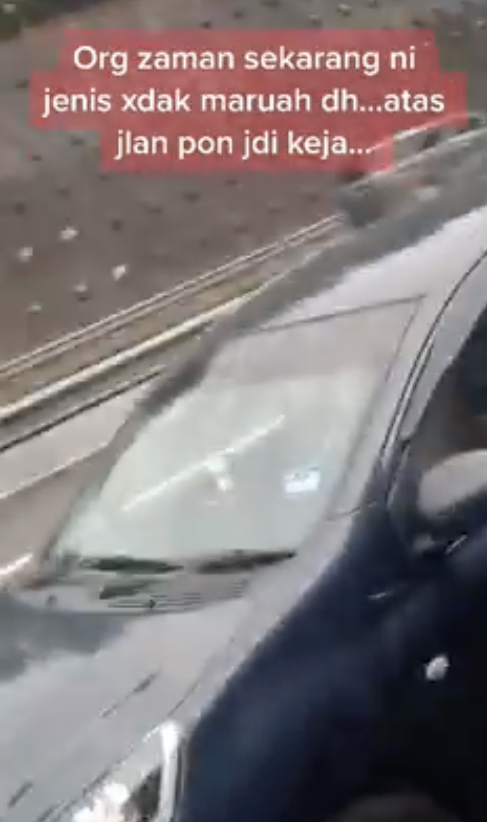 couple caught having fun while driving on highway