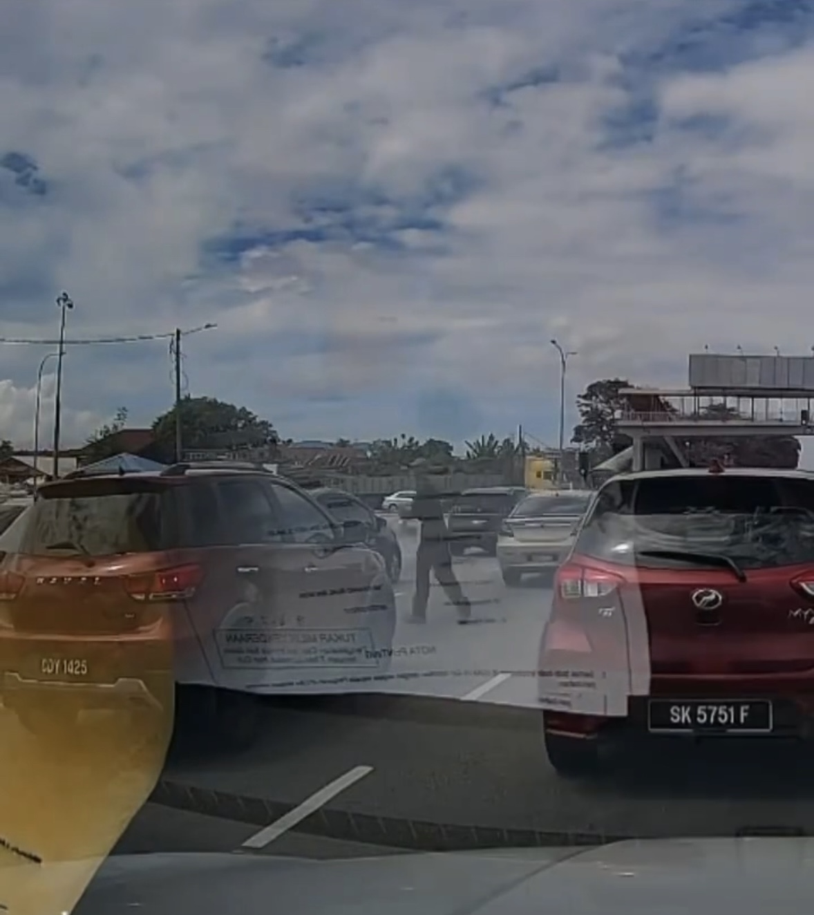 Dashcam Captures Vendor Getting Knocked Down While Crossing Road To Sell Pickled Mangoes