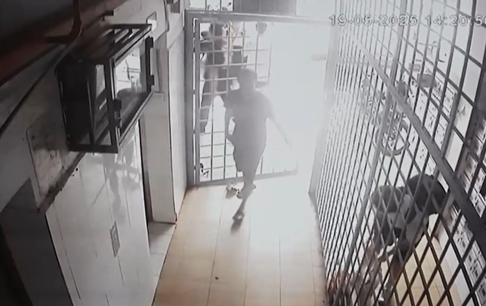 Luo entering Seremban flat