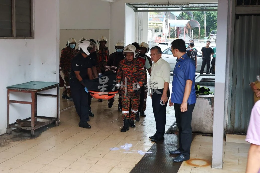 Luo's body carried away from Seremban flat