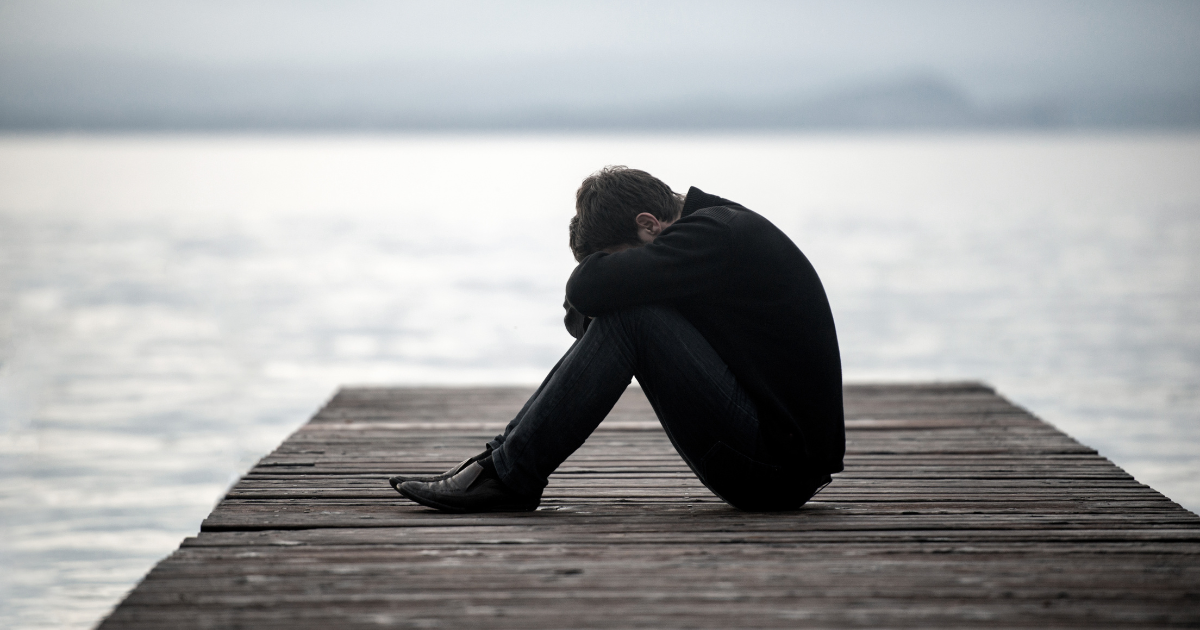 man crying alone