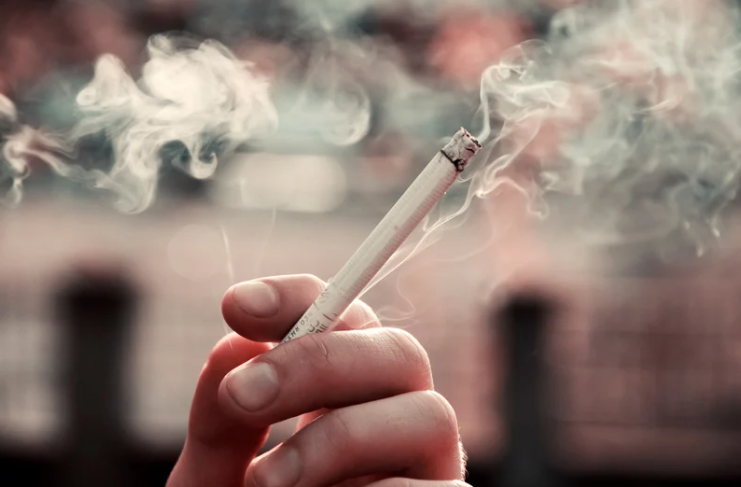 Man holding cigarette