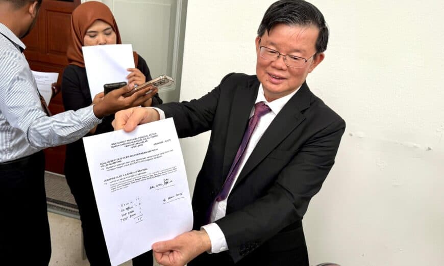 officials showing the document
