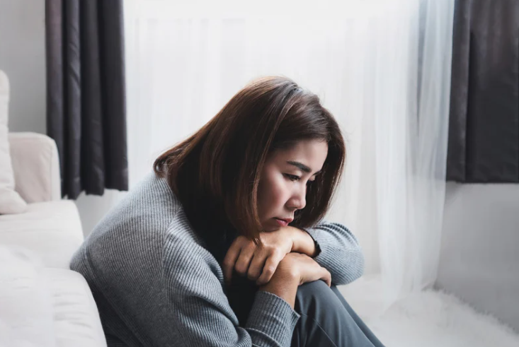 Sad and lonely Asian woman