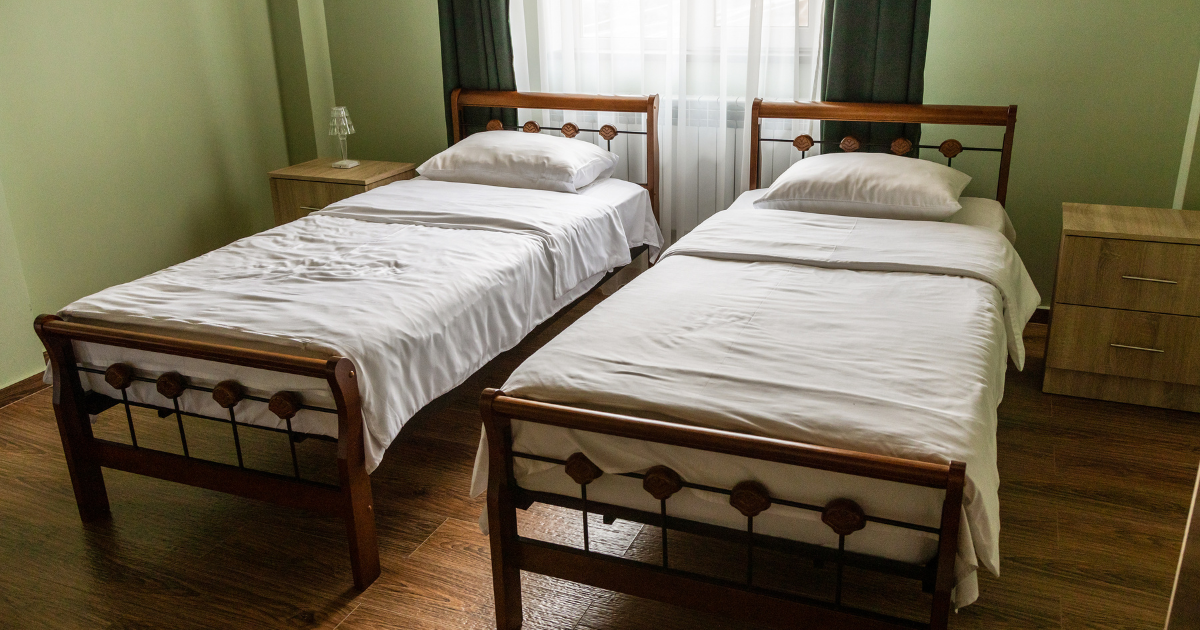 tow single bed in a room