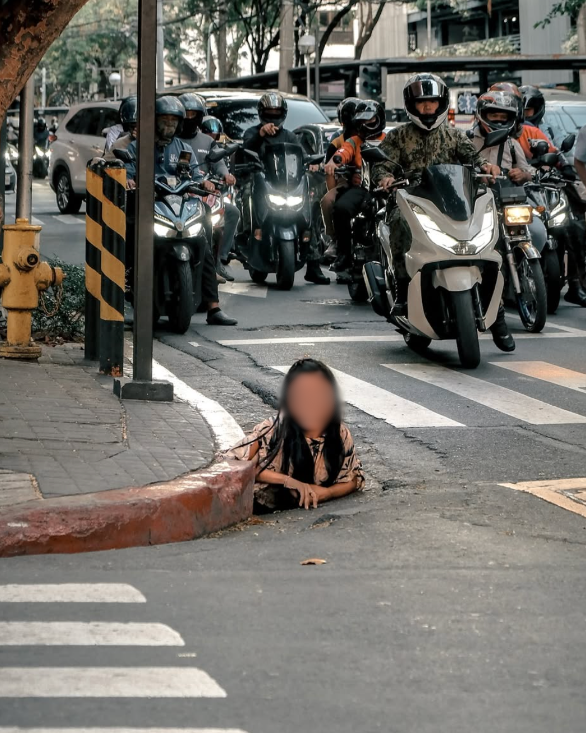 Woman Crawls Out Of Drain In The Philippines